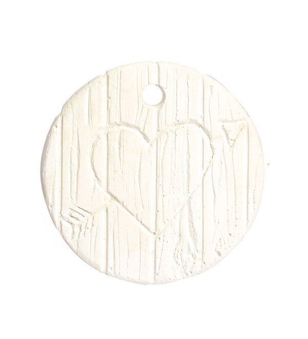 Plaster engraved wood heart